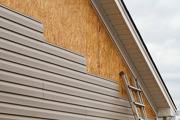 Professional Vinyl Siding technician working in Norwich, NY